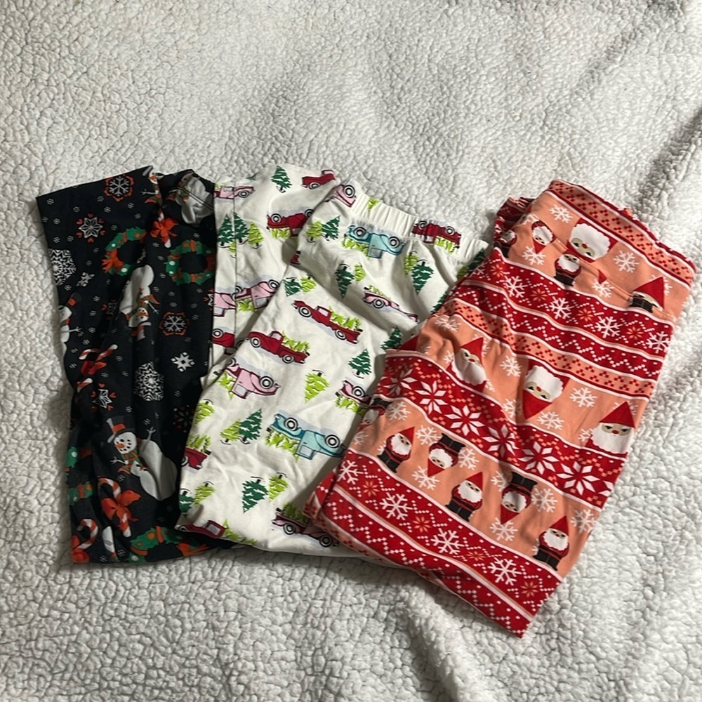 Three pair of Christmas leggings